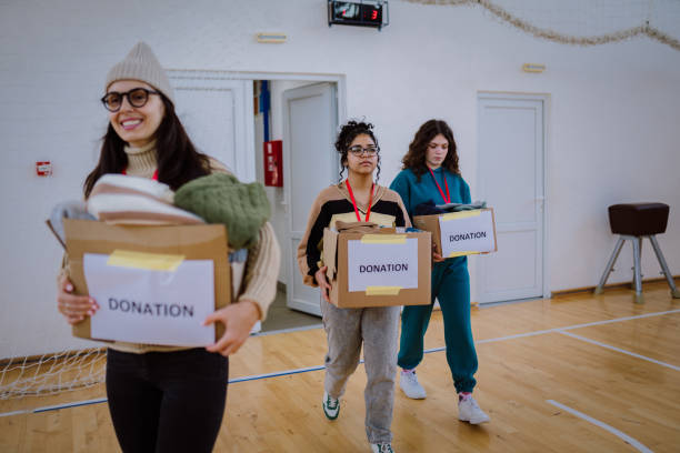 A group of strong young women, helping people in need